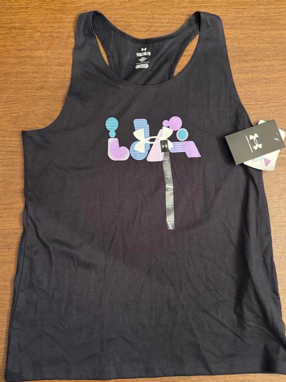 Under Armour Black Racerback Tank with Pastel Graphic. Size youth large 12-14